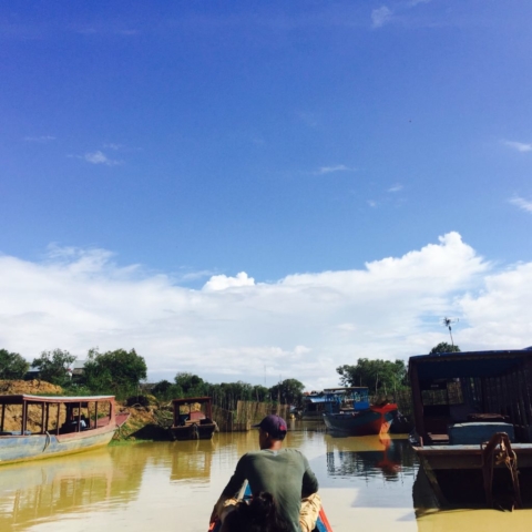 A local fisherman traverses the busy river deltas leading to the Tonle Sap Lake- the largest freshwater lake in Southeast Asia, and the center of Cambodia's food provisions.